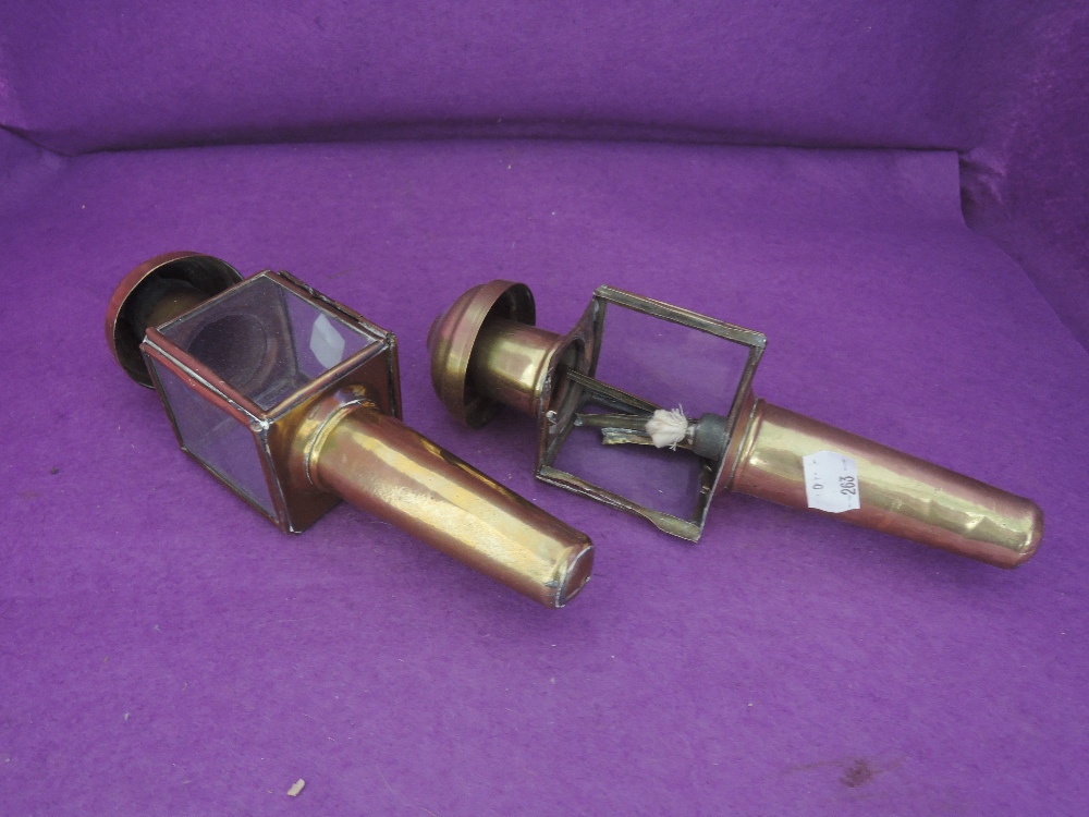 A pair of brass carriage lamps