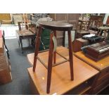 A vintage bar or kitchen stool