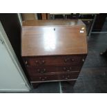 An early 20th century mahogany bureau