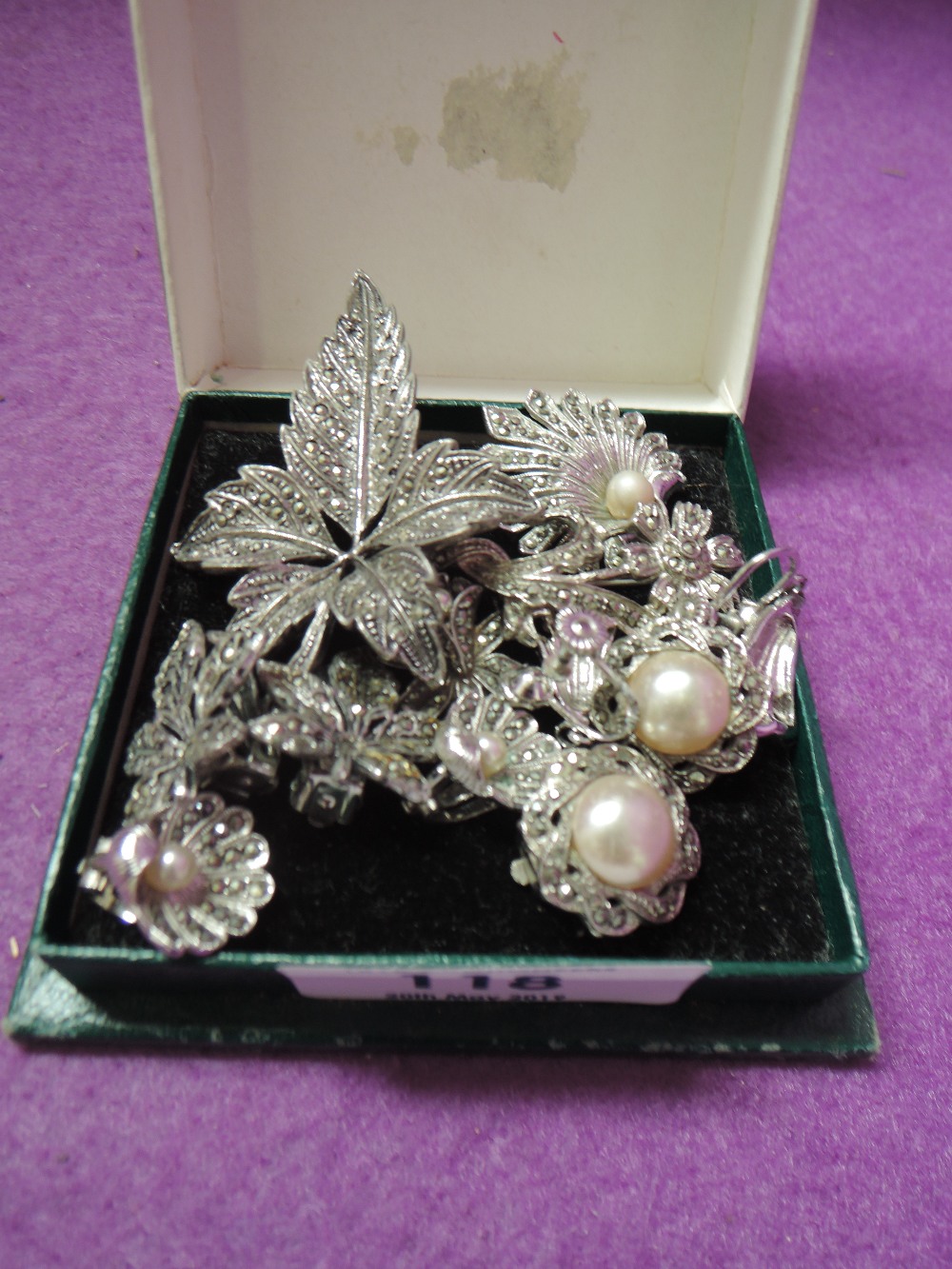 A selection of marcasite jewellery, some stamped silver/800 including brooches and earrings etc
