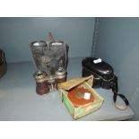 A selection of vintage binoculars and similar