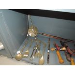 A selection of kitchen wares including brass utensil set etc