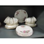 A selection of tea cups and saucers by Imperial and Colclough