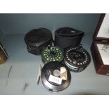 A selection of fly fishing reels including Shakespeare