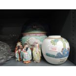 A selection of oriental ceramics including Cantonese palette lidded urn and Immortal figures