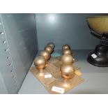 A set of 4 pairs of brass cast door handles