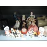 A selection of figures and figurines including S Hancock spill vase