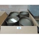 A box of fifty 6' cake tins