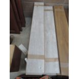 A quantity of Limed Oak effect laminate flooring