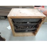 A small storage chest and contents