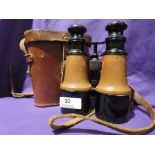 A pair of military related binoculars marked War Office