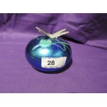 A Heron glass paper weight with dragonfly theme