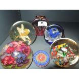 A selection of paper weights including Caithness Windfall
