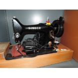 An electric Singer Sewing machine model 99K in great condition bearing Red S badge