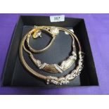 Four pieces of gold plated jewellery by Monet including bracelet, necklaces and earrings, all having