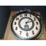 A childs or similar wall clock by Lionel as new with box and rotating train