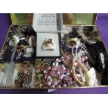 A selection of costume jewellery including ceramic scarf ring with hunting scene, wrist watches,