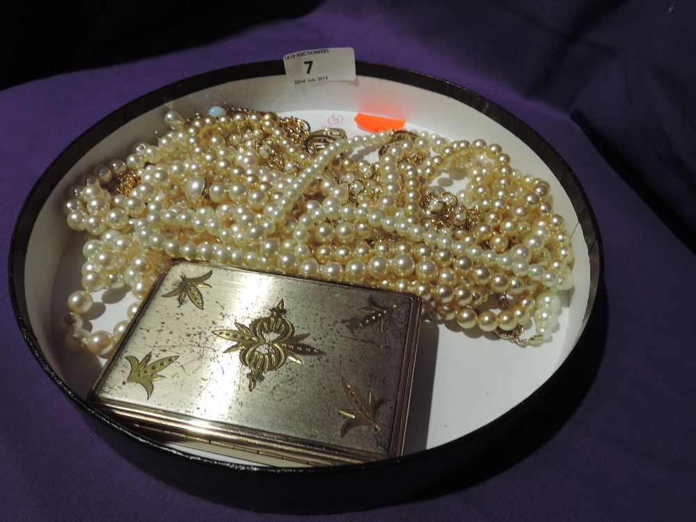 A selection of costume jewellery including simulated pearls, gold plated hoop and simulated pearl