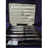 A cased set of six handled fruit knives having moulded decoration, Sheffield 1922, Cooper Brothers &