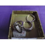 Three white metal dress rings stamped 925/sterling including enamelled and marcasite