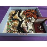 A selection of costume jewellery including Jonette jewellery panther brooch, golly badge, beads,