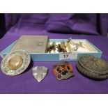 A small selection of vintage white metal costume jewellery including shield brooch, claw brooches,