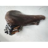 A vintage leather bicycle seat
