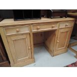 A stripped pine dressing table/desk