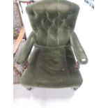 A 19th century stained frame armchair having button back and later moss green upholstery, on