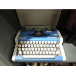 An Olympia traveller de luxe typewriter