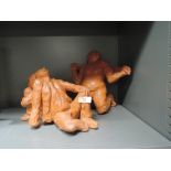 Two studio pottery sculptures in terracotta of people bathing