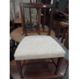 A 19th century mahogany dining chair having slit slat back with later 20th century cream upholstered