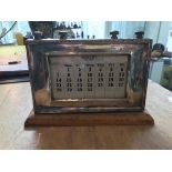 A Birmingham 1932 silver hallmarked framed perpetual desk calendar PAT No 9984