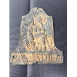 An early 19th century palladium fire insurance fire badge of pressed metal construction, with trac