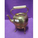 A hand worked arts and crafts design spirit burner and kettle