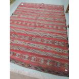 Two hand woven rugs including Moroccan