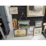 A selection of original art works and prints including tree top hill