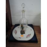 A cake stand by Royal Worcester, brass figure and a decanter