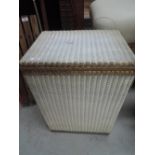 A vintage Sirrom woven fibre blanket box in the Lloyd Loom style