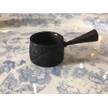 A carved Irish oak miniature pan