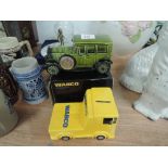 A Wabco boxed truck money box and a F-1925 model car thermometer