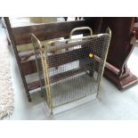 An Edwardian brass tri fold mesh fire screen