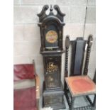 A small size long case clock with Chinese style decoration