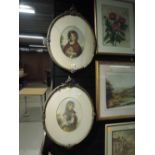 A pair of Victorian prints in oval gilt and plaster frames