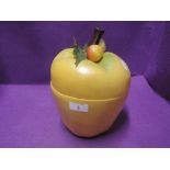 A vintage ice bucket in the form of a large apple