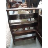 A late Victorian oak bookshelf of ecclesiastical design