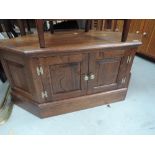 A modern oak corner TV cabinet