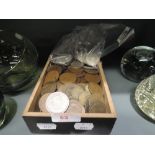 A selection of collectable coins and currency