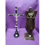Two religious items including figure of arc angle and Catholic style crucifix