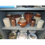 A selection of earthen ware stone pots and jars